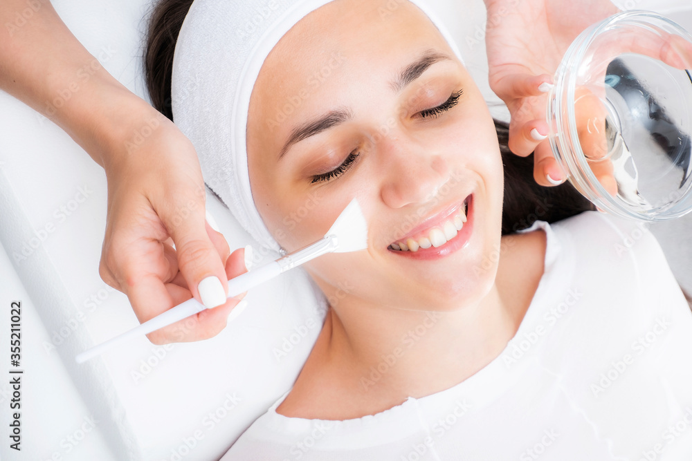 Face peeling at the beautician. Facial treatments. Chemical and salicylic peels.