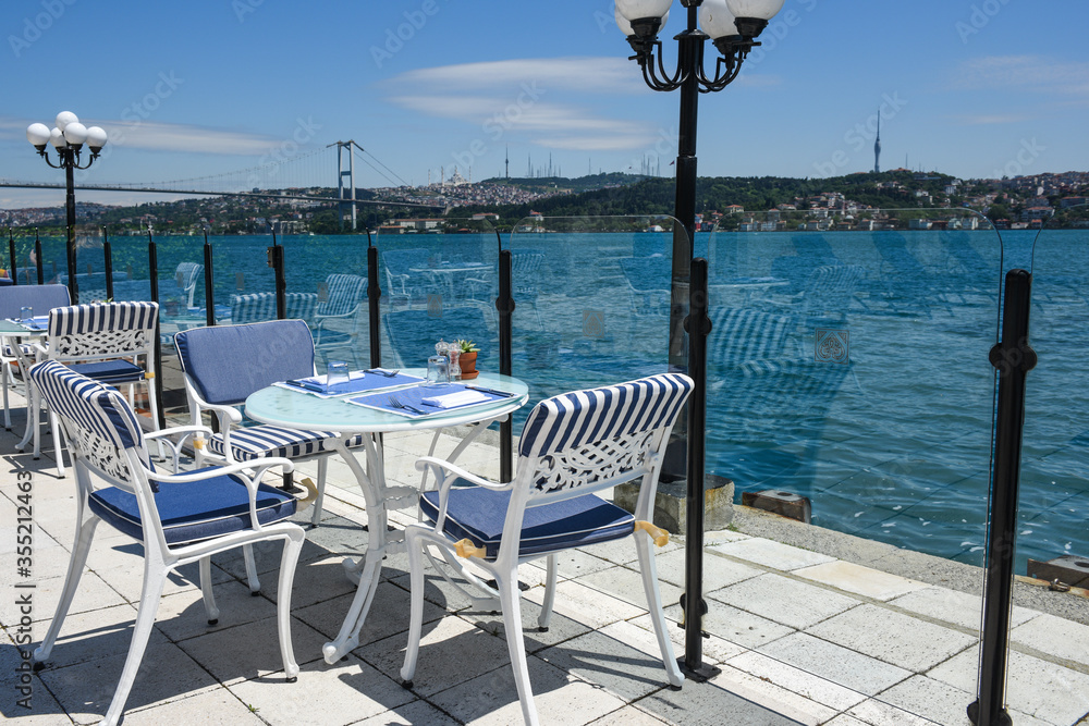 Ttables and chairs by the sea