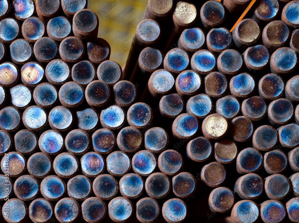 Closed up of steel rod bar in bundle as round shape pattern Closed up of steel rod bar in bundle as round shape pattern