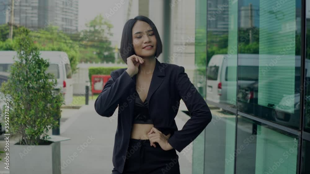 Fashion portrait of young beautiful woman sexy outdoor. black suit, standing on urban background. Fashion portrait of young beautiful woman sexy outdoor. black suit, standing on urban background.
