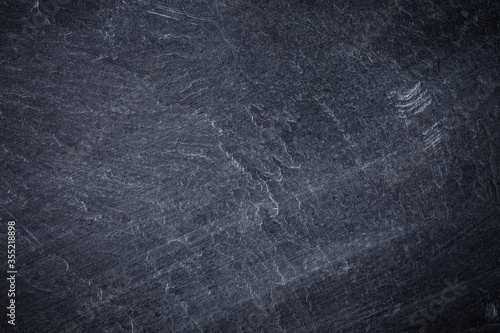 Nature patterned of dark gray slate texture, abstract background