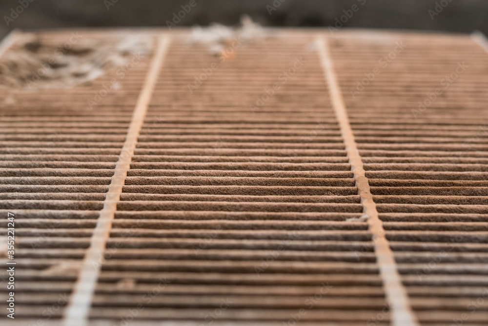 Car air conditioner filter in the cabin of the car is dirty and damaged