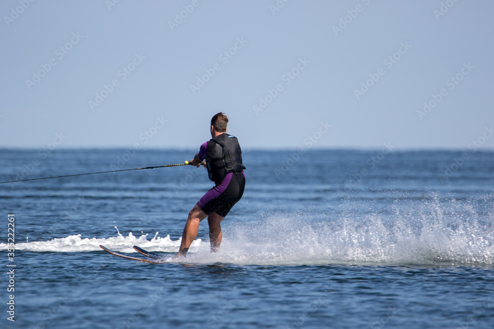 waterskiing man on the ocean