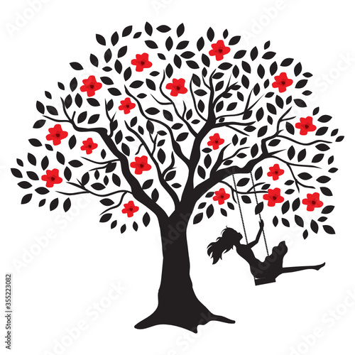 young woman and blooming tree swing