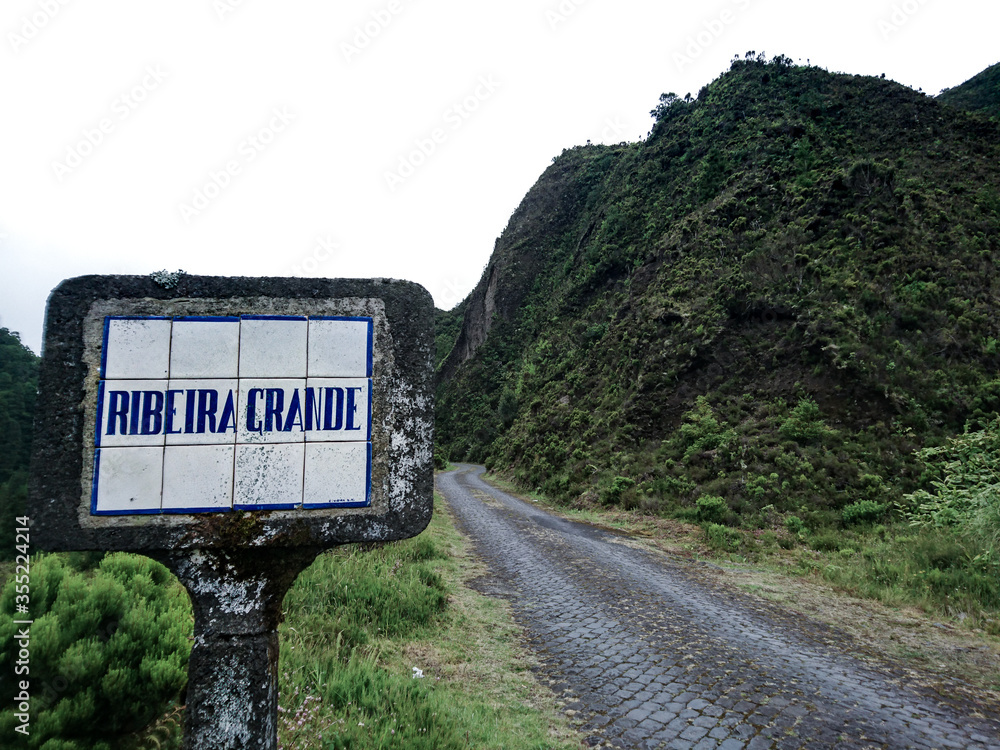 Antique road sign made of tiles in Ribeira Grande, Azores