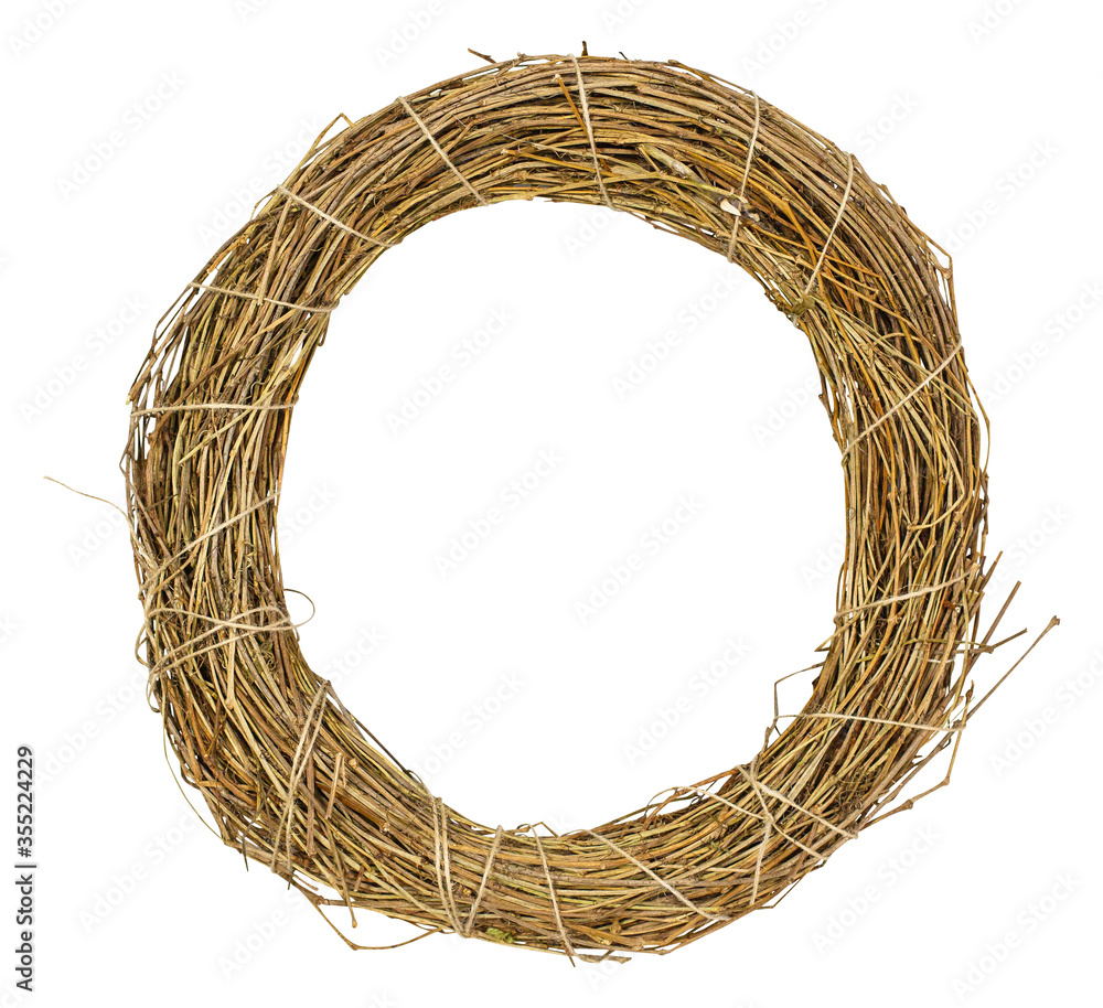 Obraz premium Wreath or circle framel from dry grape branches isolated on white background