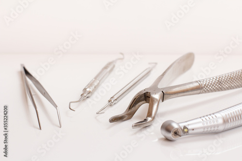 Set of metal dental instruments for teeth dental care