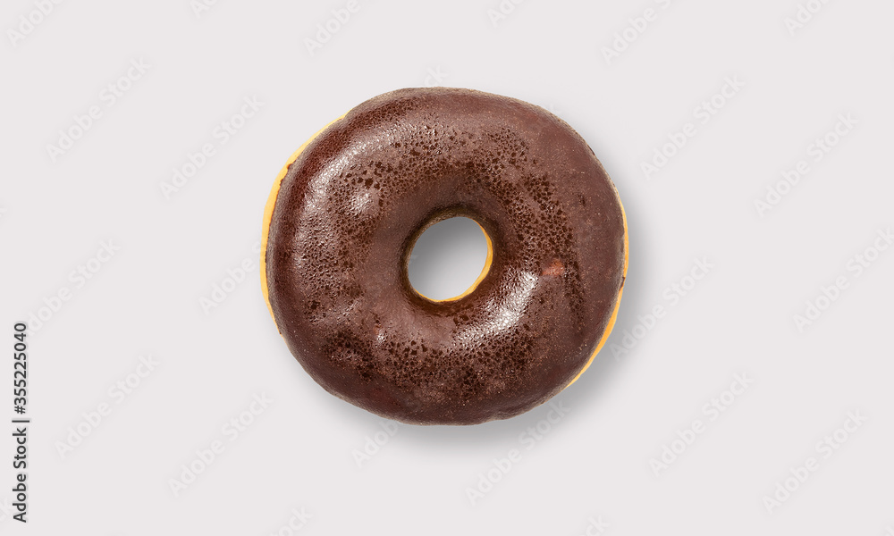 Glazed chocolate donut on a white background Glazed chocolate donut on a white background