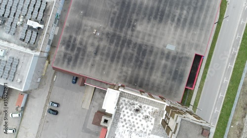 Top Down View of Empty Industrial Area With Solar Panels on Top photo