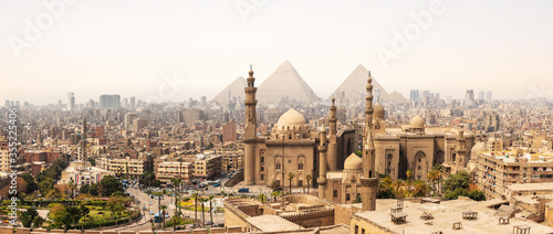 The Mosque-Madrassa of Sultan Hassan In front of the Giza Pyramids, Cairo, Egypt