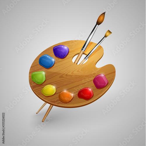 Art palette with brushes icon.