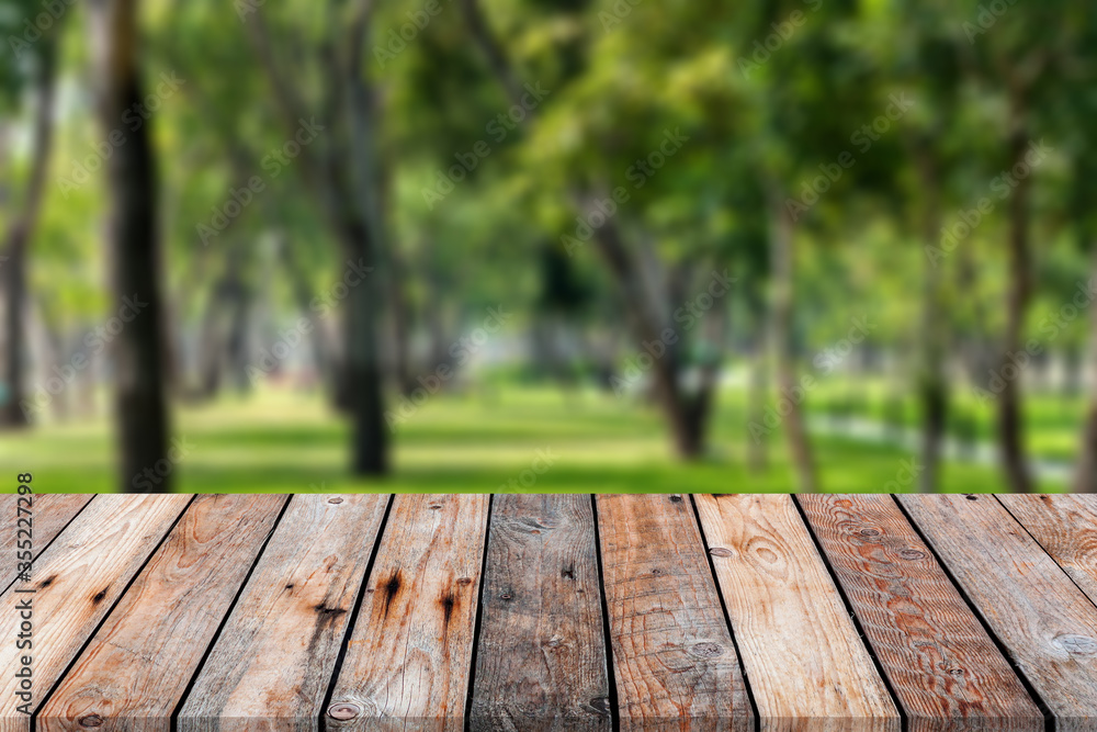 wooden table over blurred background for show your product on image