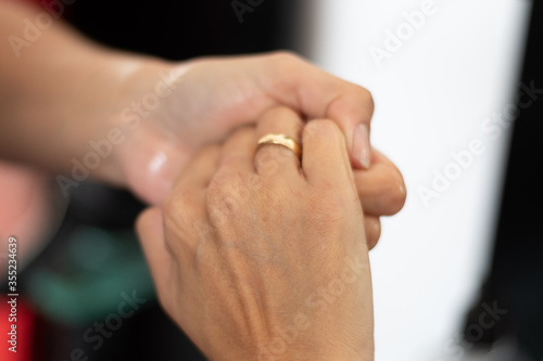 woman washed our hands with alcohol