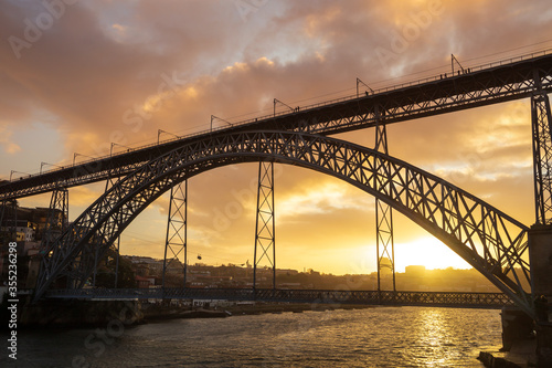 Luis I Bridge (Ponte) over Douro river in Porto, Portugal. Beautiful colorful sky at  sunset. © Predrag Jankovic