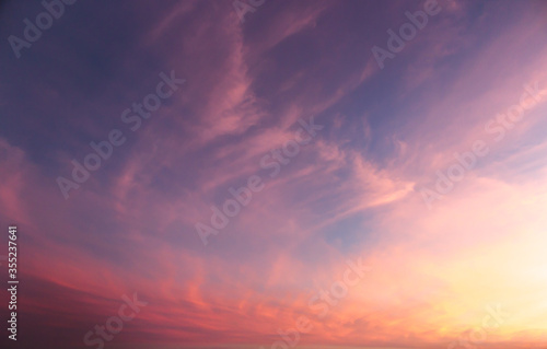 Fototapeta Naklejka Na Ścianę i Meble -  Vibrant sunset sky with clouds