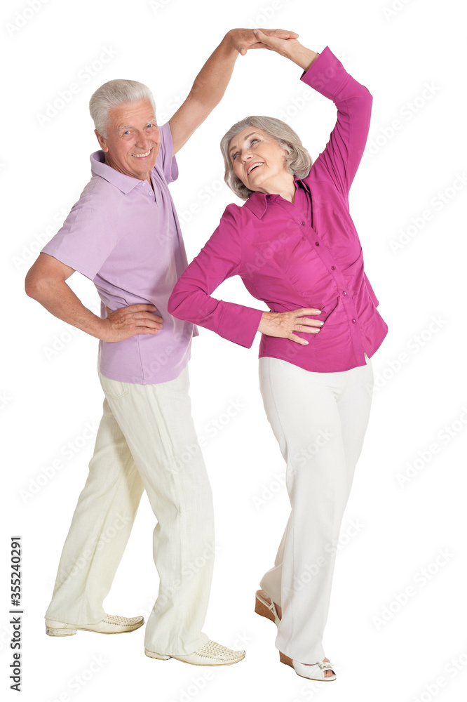 Happy senior couple dancing isolated on white background Happy senior couple dancing isolated on white background
