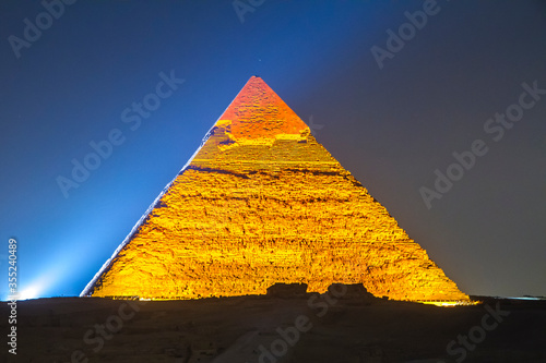 Great Pyramid of Giza illuminated at night  UNESCO World Heritage site  Cairo  Egypt.