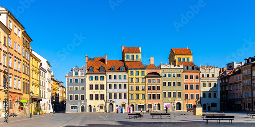 Panoramic view of historic Old Town quarter market square, Rynek Starego Miasta, with tenement houses of Dekert’s Side and Warsaw Mermaid statue in Warsaw, Poland photo