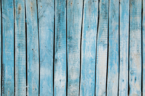 Old wooden natural texture painted in blue, brown, white, green color