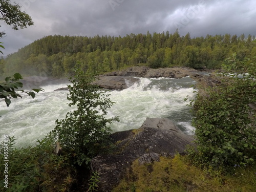 the norwegian national waterfall maalselvfossen in troms northern norway