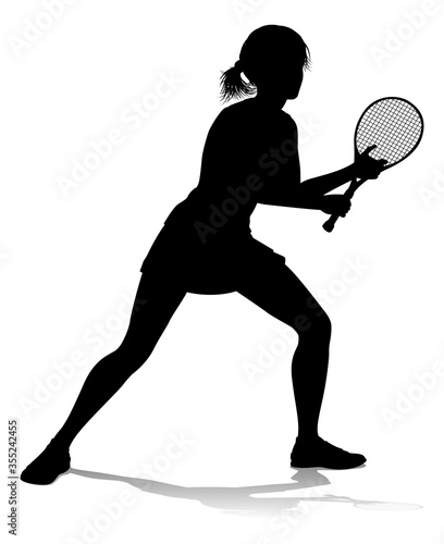 A tennis player woman female sports person in silhouette