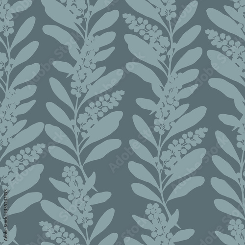 Vector seamless pattern with silhouettes of acacia flowering branch. Grayscale pattern photo