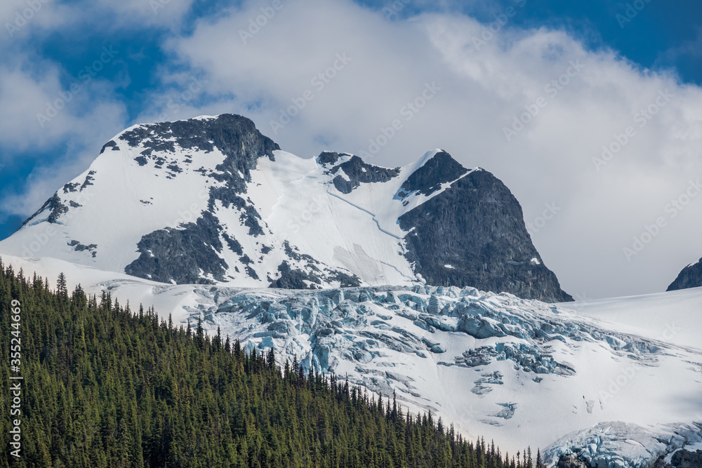 Glacier covered peak of mountains in summer