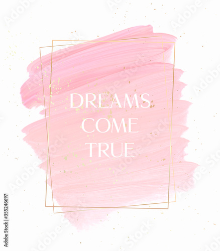 Dreams come true quote sign pastel pink over pink brush paint creative background with golden frame and golden dust. 