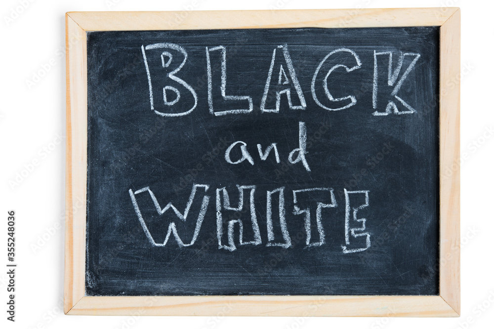 Fototapeta premium Black and White - written on chalkboard. Concept message