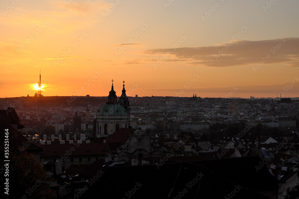 Dawn over Prague. The urban skyline of an ancient European city at dusk.