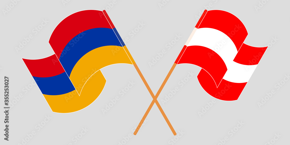 Crossed and waving flags of Armenia and Austria Crossed and waving flags of Armenia and Austria