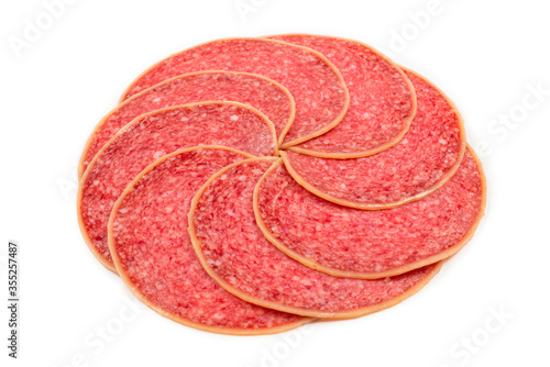 Salami slices isolated on white background.