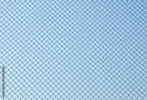 Wire mesh steel on blue sky background