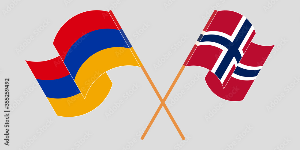 Crossed and waving flags of Armenia and Norway