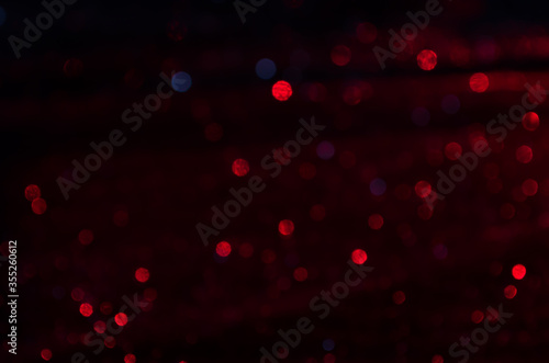 Red and blue abstract bokeh background.