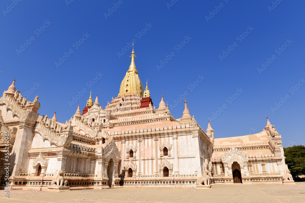 The Ananda Temple with its golden tower is a large buddhist temple and one of Bagan's most important pagoda. Old Bagan, Myanmar (Burma)