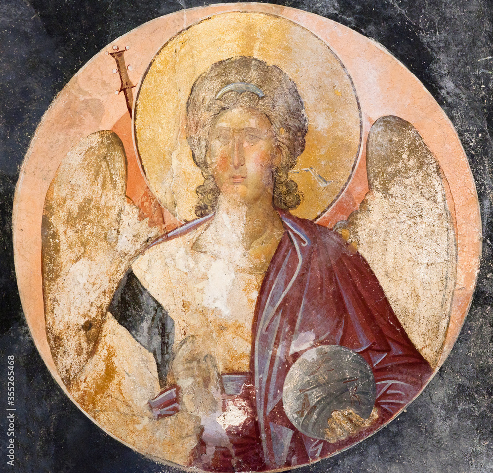 Ancient Byzantine mural painting fresco with Archangel Michael in the