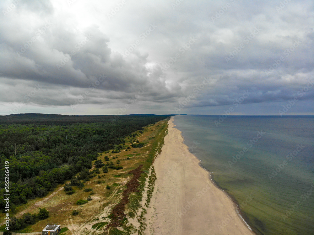 Lithuanian sea shore at Curonian spit. Unique place among Baltic sea and Curonian lagoon Lithuanian sea shore at Curonian spit. Unique place among Baltic sea and Curonian lagoon