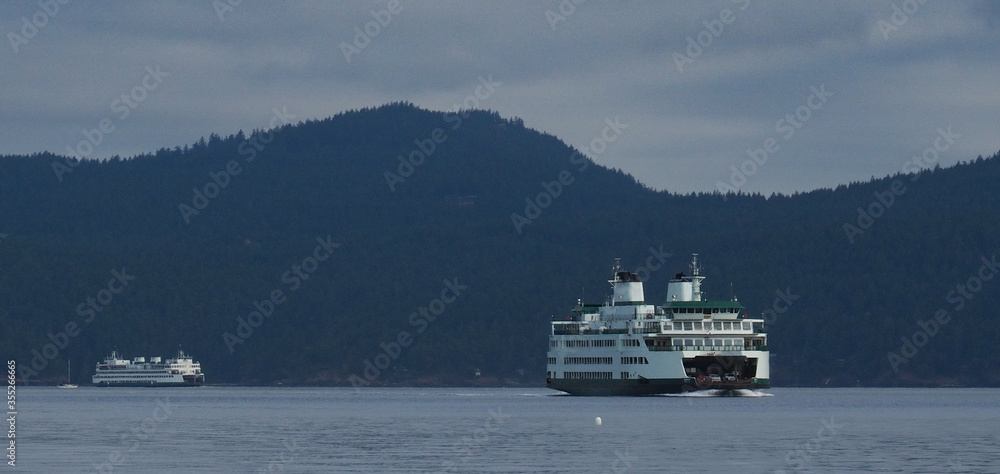 Two Washington State Ferries underway in San Juan Channel in San Juan Islands Two Washington State Ferries underway in San Juan Channel in San Juan Islands