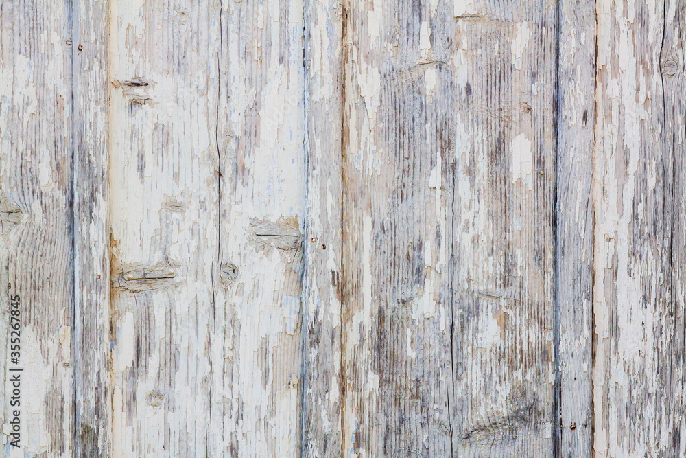 Wooden doors from old boards with peeling paint Wooden doors from old boards with peeling paint
