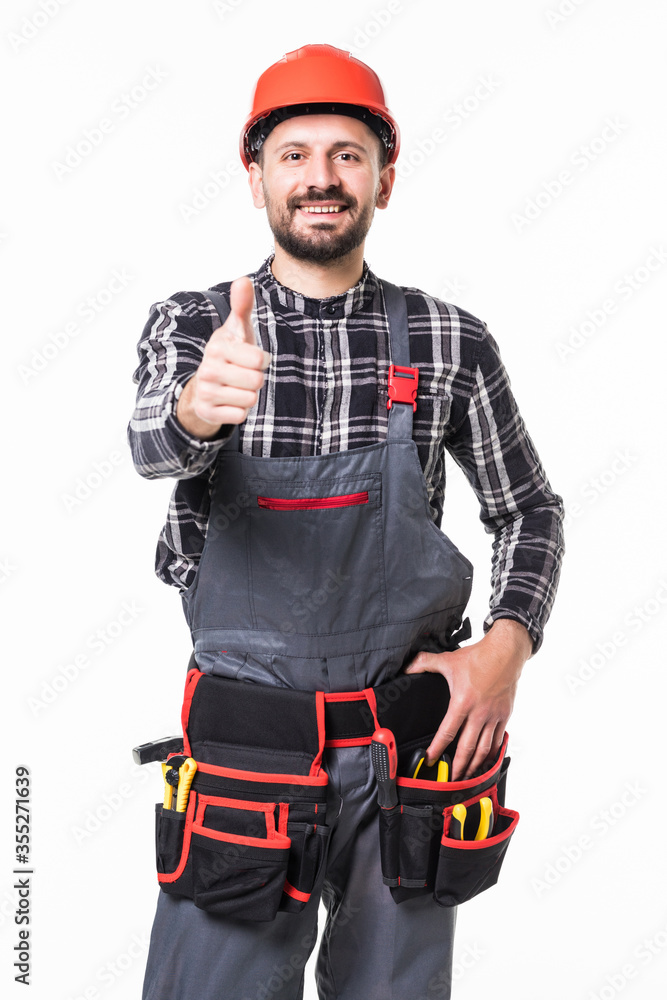 confident young manual worker thumbs up isolated on white background confident young manual worker thumbs up isolated on white background