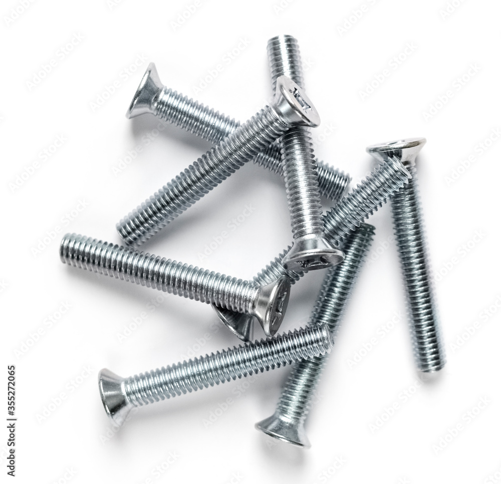 screw nuts close up. White background. Corrosion-proof screws, bolts for construction and repair. Top view screw nuts close up. White background. Corrosion-proof screws, bolts for construction and repair. Top view