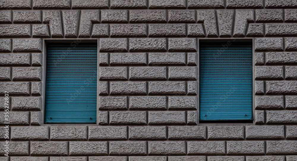 ROME, ITALY - DECEMBER 01, 2019:  Windows - architectural detail on historical building, in Rome, Italy