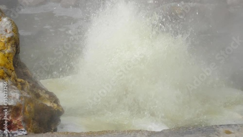 thermal pool from volcanic lake steaming in furnas Azores Portugal slow motion photo