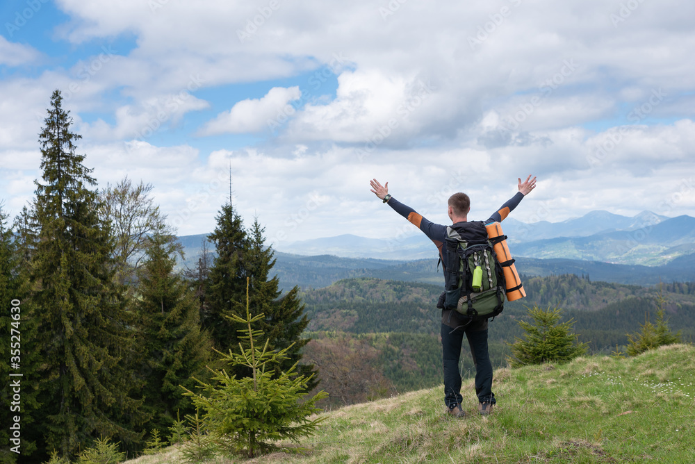 hiker with equipment spends time hiking in the mountains hiker with equipment spends time hiking in the mountains