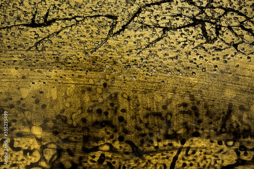 Light brown with gold abstract texture with dark scratches, cracks and spots