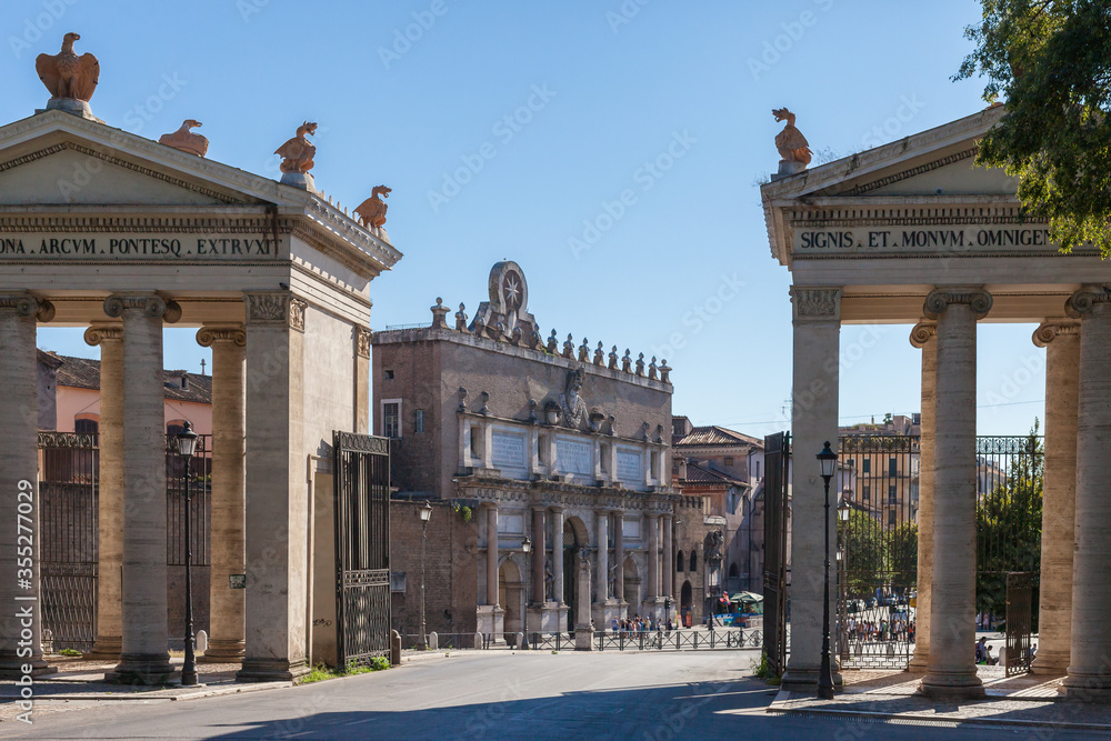 Obraz premium ROME, ITALY - 2014 AUGUST 17. Santa Maria dei Miracoli and Santa Maria in Montesanto are two sister churches in Rome. They are located on Piazza del Popolo square.