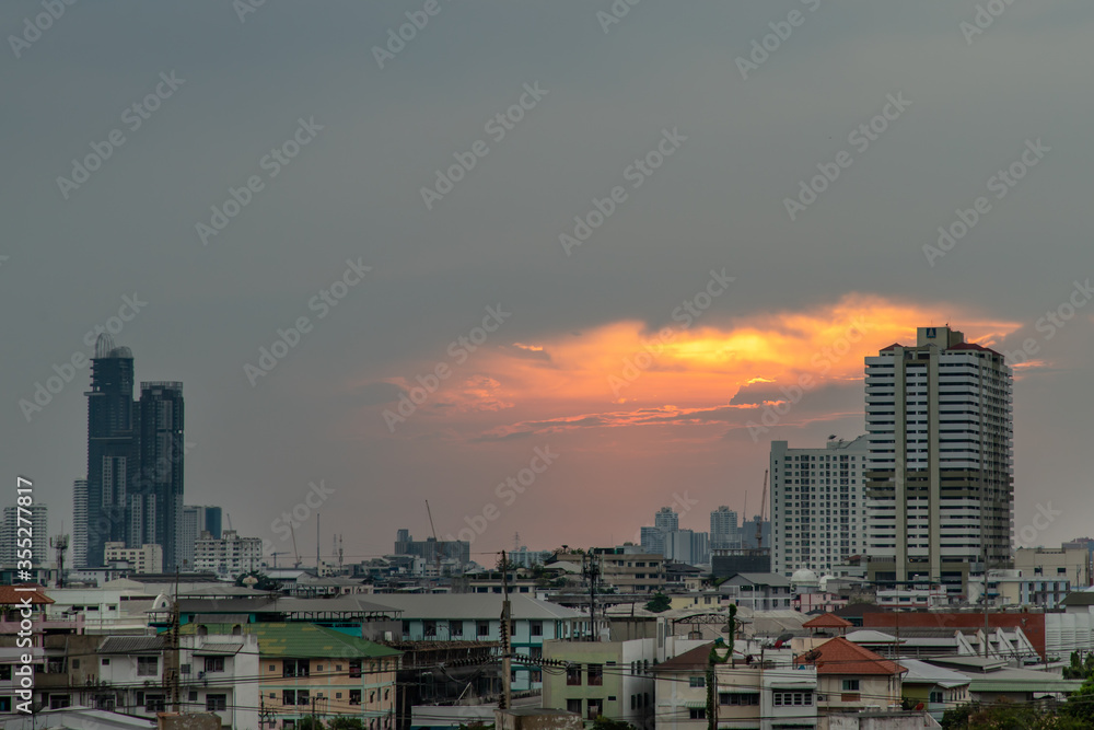 Sky view of Bangkok with skyscrapers in the business district in Bangkok in the evening beautiful twilight give the city a modern style. Selective focus.