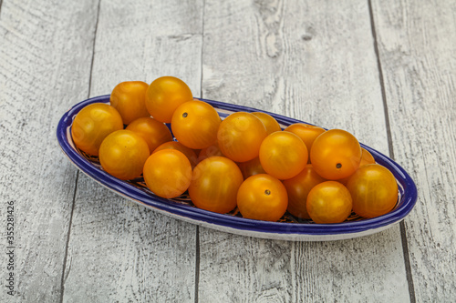 Fresh yellow cherry tomato heap