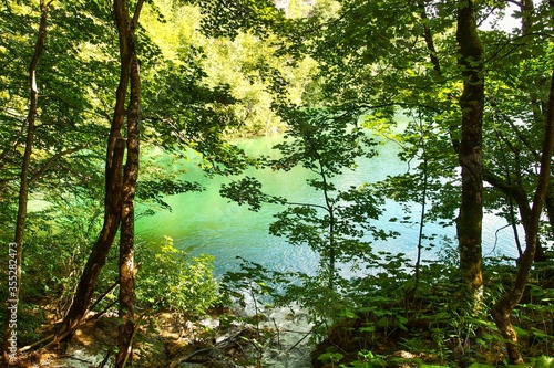 Landscape of turquoise lake in the forest. Plitvice Lakes National Park  Croatia. Nacionalni park Plitvicka Jezera  one of the oldest and largest national parks in Croatia. UNESCO World Heritage.